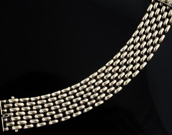 A 9ct gold brick link bracelet, 17.5cm.